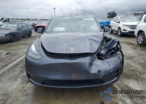 2023 Tesla Model Y from USA, damaged, VIN 7SAYGDED0PF945725